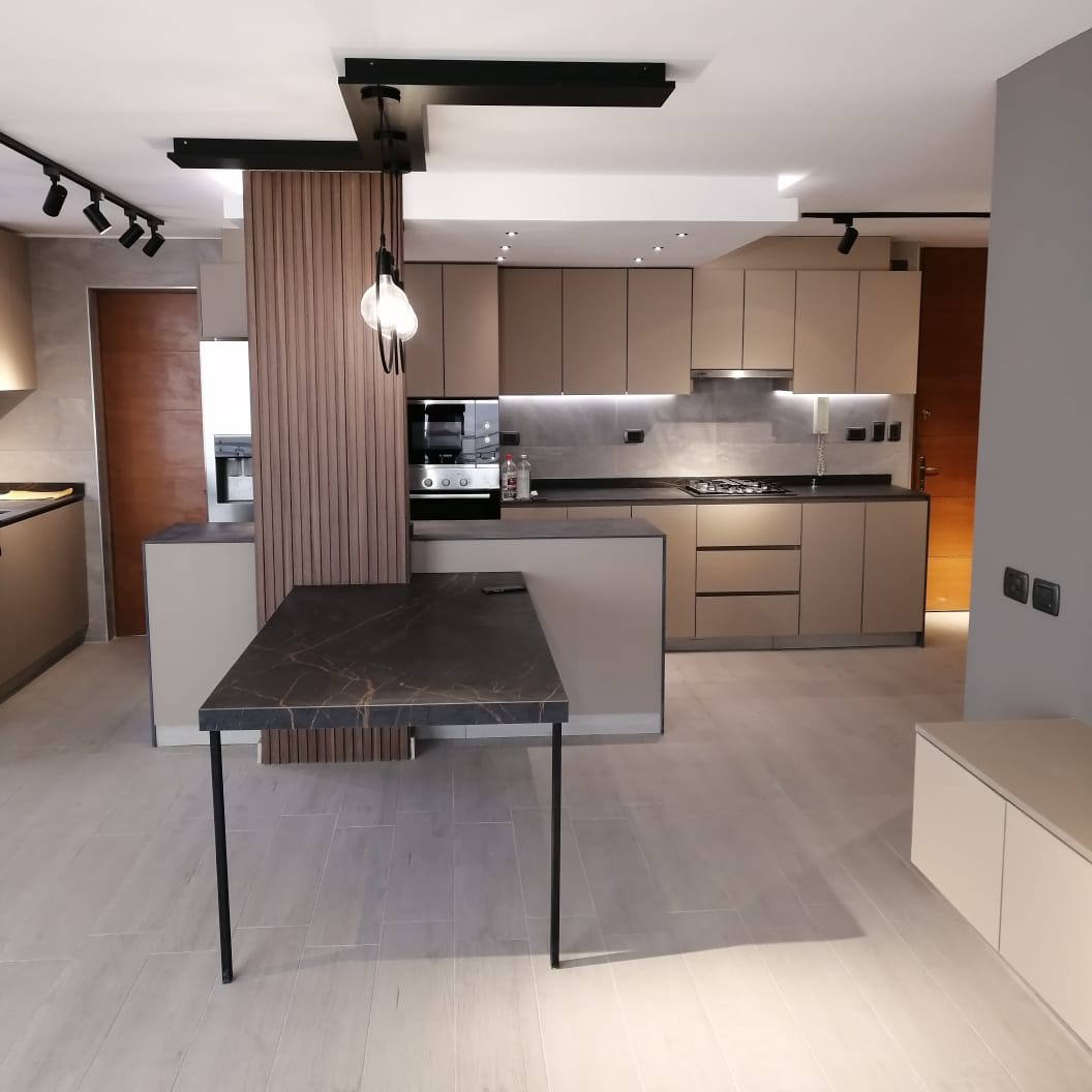 Taupe kitchen with integrated lighting