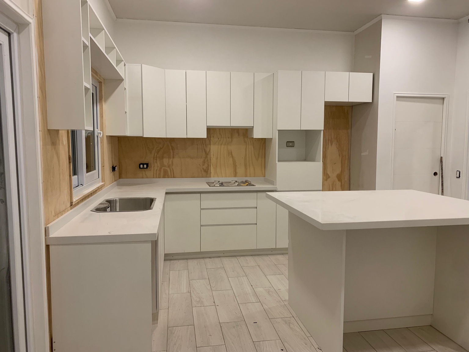 White custom kitchen with island