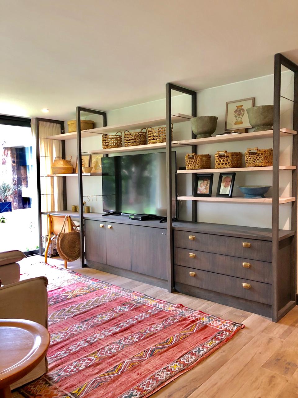 Media wall and shelving unit