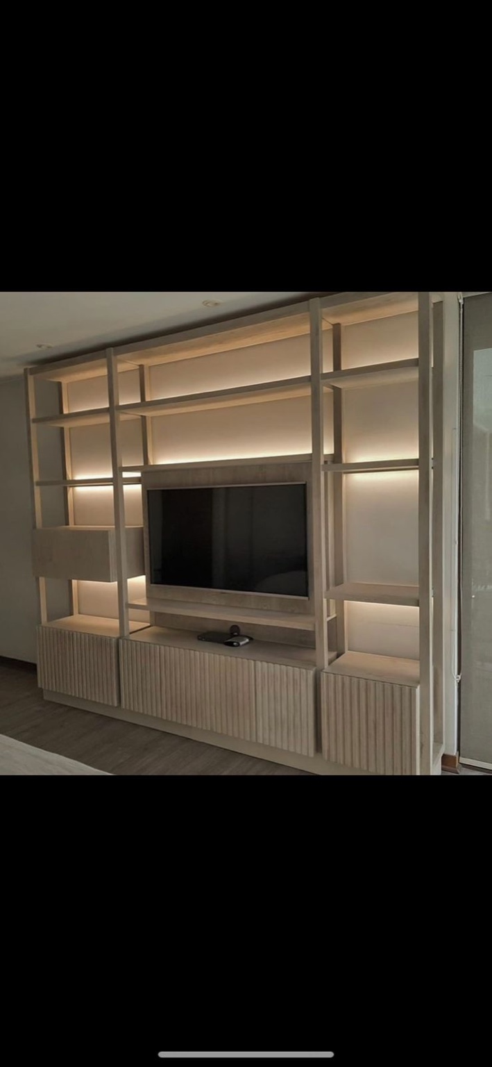 Backlit TV wall with shelving